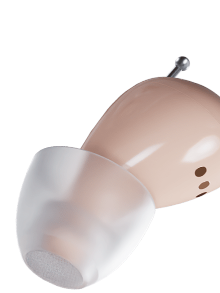 Detailed view of Audien in-ear hearing aid with silicone ear tip and pull tab for easy removal